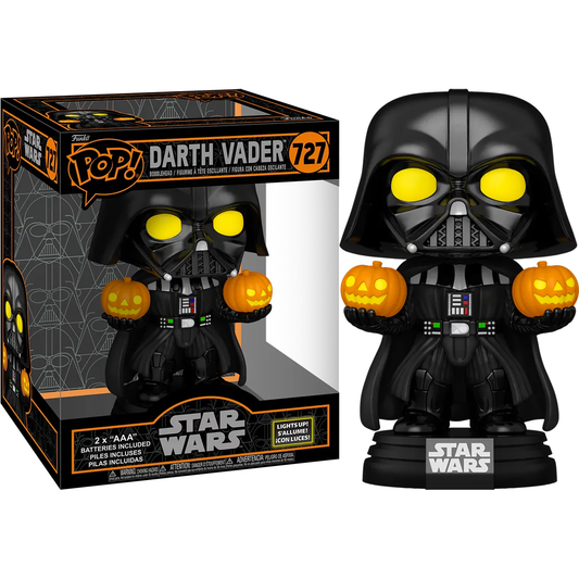 The Star Wars - Darth Vader (Light Up) 6 Pop! Vinyl features a stylized design with Darth Vader holding glowing jack-o-lanterns and bright yellow eyes, perfect for Halloween. Its boxed as number 727 and includes batteries for its light-up feature.